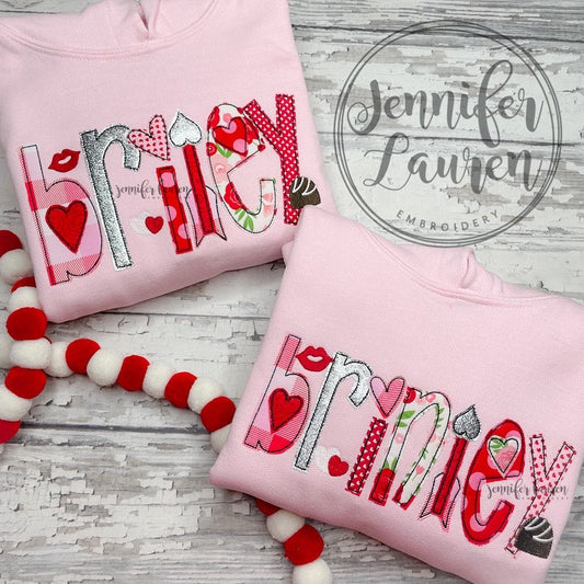 Hooded sweatshirt with applique