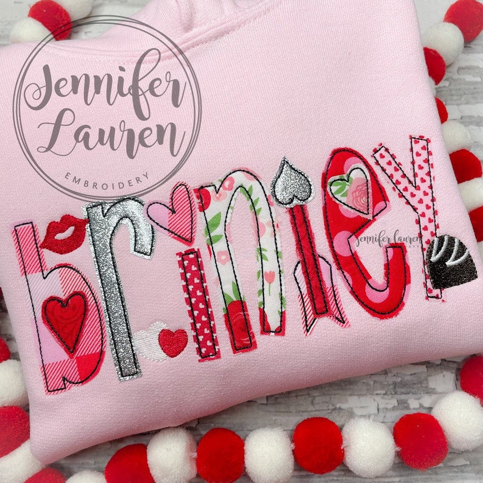 Hooded sweatshirt with applique