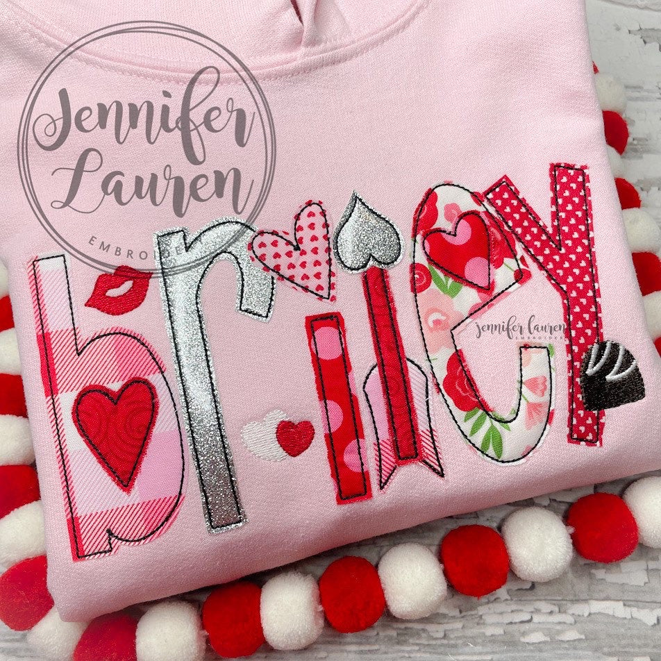 Hooded sweatshirt with applique